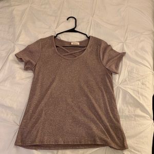 Pinc short sleeved shirt with cross straps